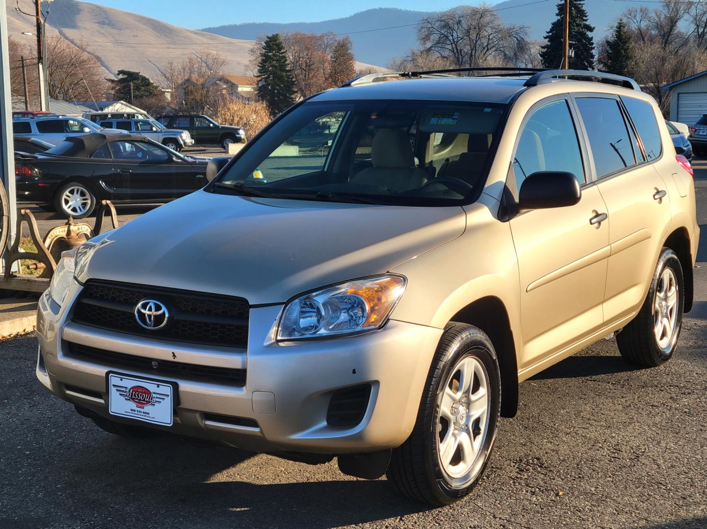 2010 Gold /Tan Toyota RAV4 I4 (2T3BF4DV7AW) with an 2.5L engine, Automatic transmission, located at 450 N Russell, Missoula, MT, 59801, (406) 543-6600, 46.874496, -114.017433 - Great Running AWD SUV. Air. Cruise. Tilt. Power Windows and Locks. Very Clean. - Photo#1